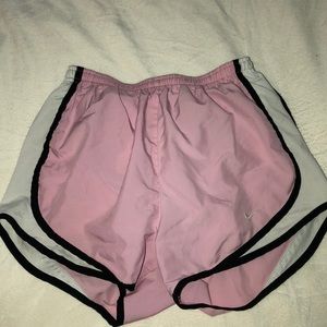 Pink and white nike shorts
